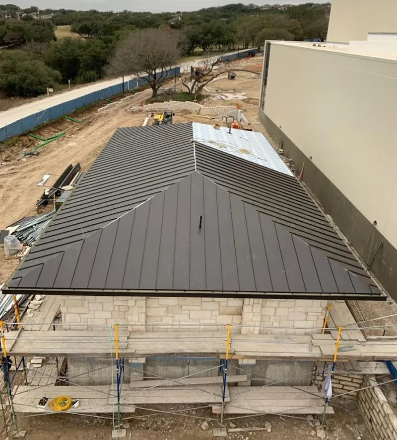 Metal roof new construction with scaffolding in Concord